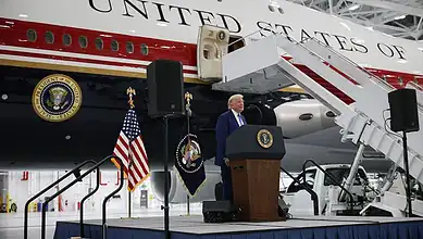 Former President Trump speaks at the unveiling of a Qatari luxury jet with presidential insignia.
