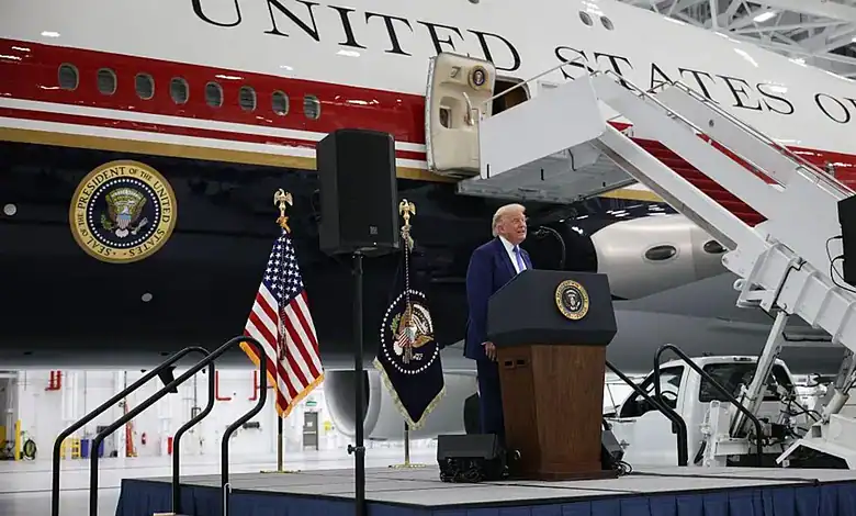 Former President Trump speaks at the unveiling of a Qatari luxury jet with presidential insignia.