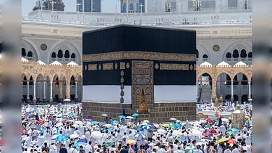 Pilgrims gather around the Kaaba at Masjid al-Haram in Mecca during Hajj pilgrimage.