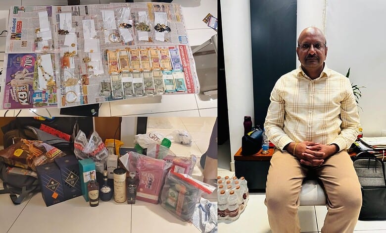 Display of seized cash, gold, and goods in an investigation scene with a man sitting nearby.
