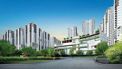 Modern residential complex with high-rise buildings and landscaped gardens in Hyderabad.