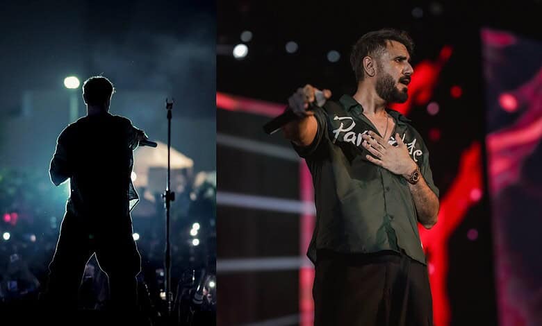 Mustafa Zahid singing passionately during a concert, with stage lights and audience in the background.