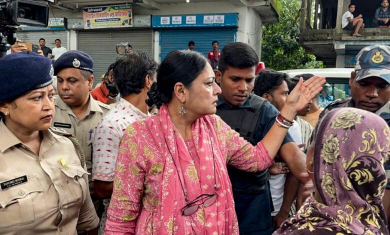 BJP leader Agnimitra Paul speaks with the family members of a 12-year-old girl who was allegedly gang-raped and murdered