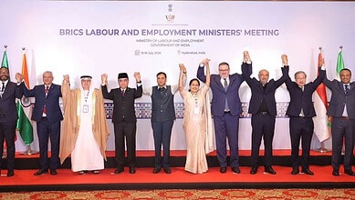 BRICS Labour and Employment Ministers' Meeting with diverse leaders on stage in Hyderabad, India.
