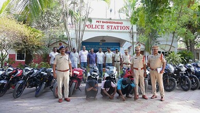 Police officers with seized bikes outside Cyberabad police station in Hyderabad.