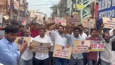 Youth protest in Dilsukhnagar demanding 20K police jobs, holding placards and banners.
