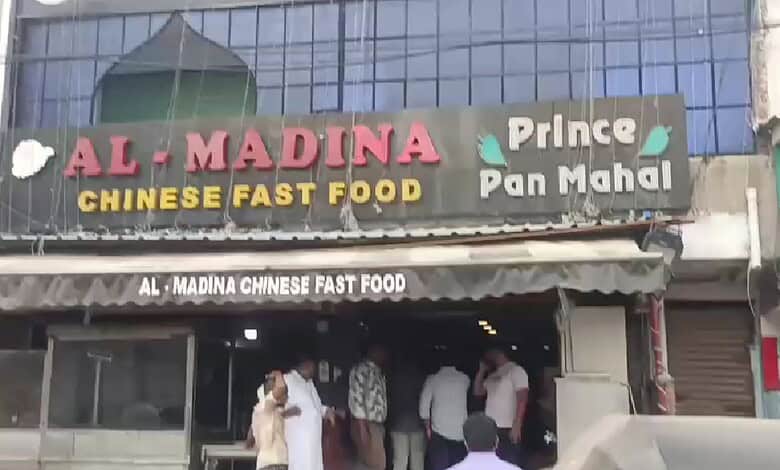 Al Madina Chinese Fast Food restaurant exterior with customers inside in Hyderabad.