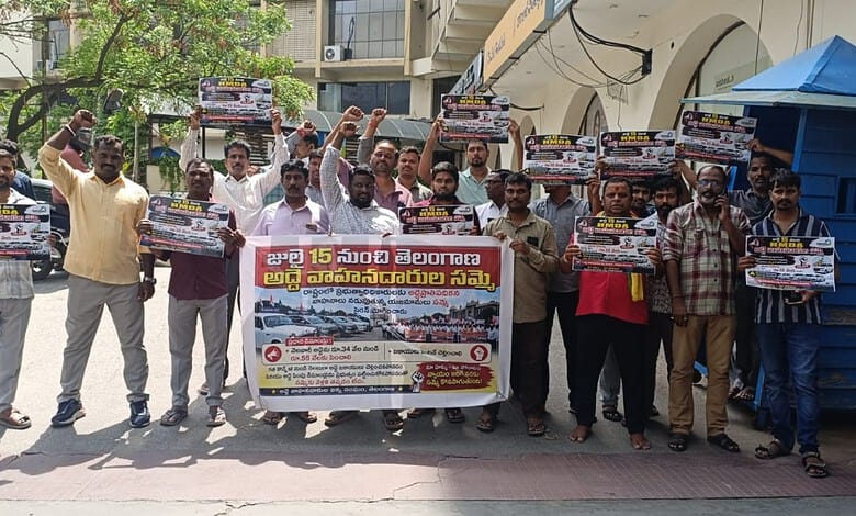 Drivers protesting for government hire vehicle issues in Telangana, holding placards and banners.