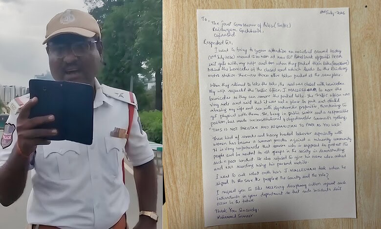 Police officer holding a tablet outdoors during daytime, wearing a white uniform and cap.