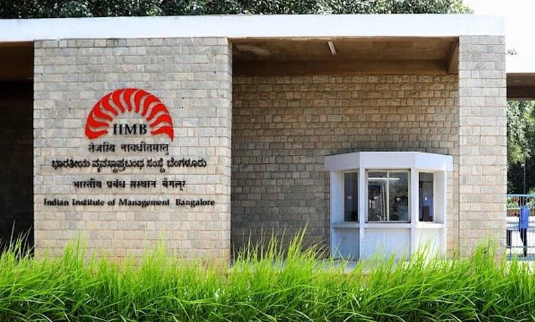 Entrance of IIM Bangalore's overseas campus in Indonesia with logo and greenery.