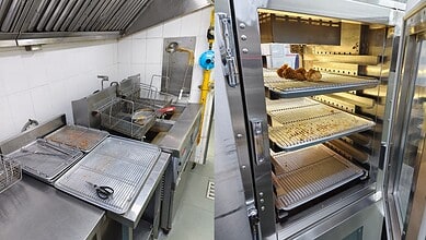 Commercial kitchen with frying equipment and food storage shelves in Hyderabad.