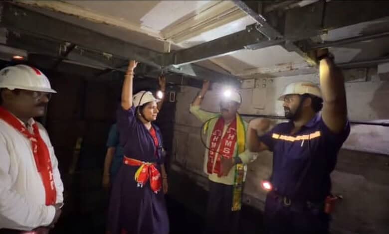 The image shows Telangana Rakshana Sena founder K Kavitha interacting with the Singareni workers inside PVK open cast coal mine in Kothagudem on Thursday, July 9, 2026.