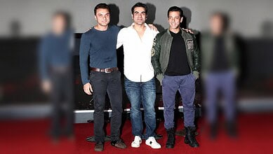 Sohail Khan with his brothers Arbaaz Khan and Salman Khan at a public event.