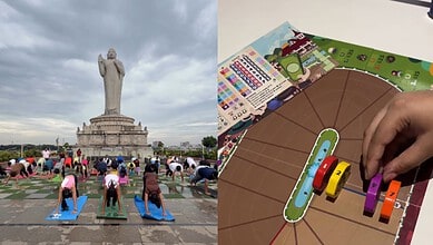 People practicing yoga outdoors near the Statue of Unity in India.