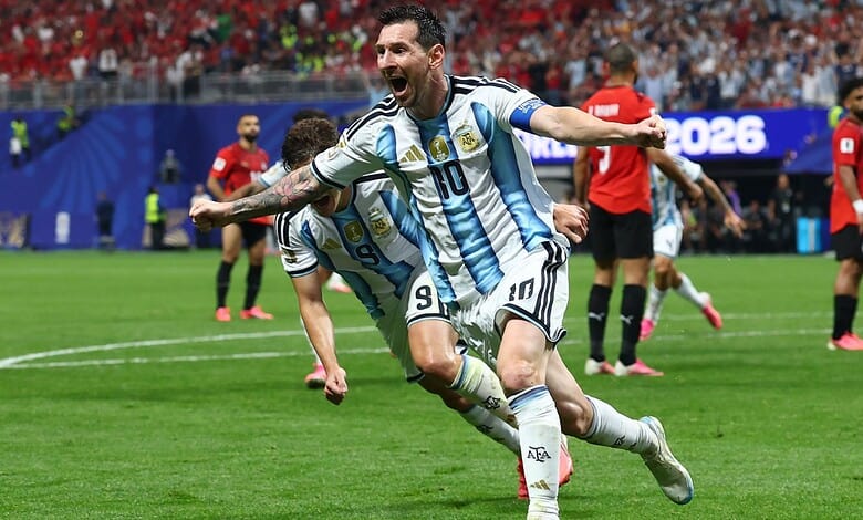 Lionel Messi celebrating a goal in Argentina's football match at the 2022 FIFA World Cup.