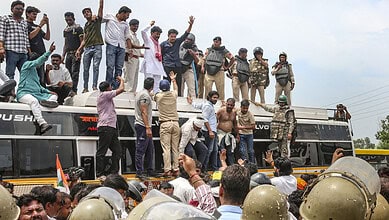 Protesting farmers and supporters gather on a bus during a demonstration in Madhya Pradesh.