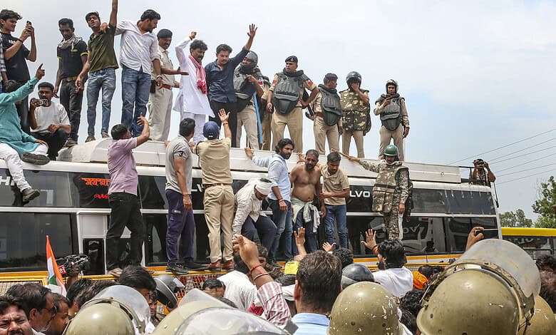 Protesting farmers and supporters gather on a bus during a demonstration in Madhya Pradesh.