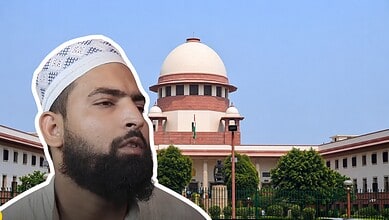 Junaid, a man with a beard and white cap, outside the Supreme Court building in India.