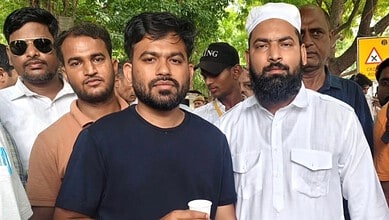 Junaid's family members support him during his release from custody.
