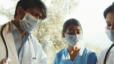 Hyderabad medics wearing masks emphasize safety measures on National Doctors Day.