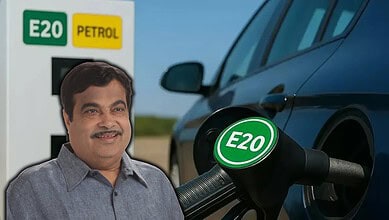 Man at E20 petrol station with a blue car refueling, promoting E20 fuel benefits.
