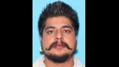 FBI adds gangster Nitish Kaushal to its most wanted list, image of man with styled hair and mustache.
