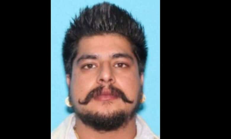 FBI adds gangster Nitish Kaushal to its most wanted list, image of man with styled hair and mustache.