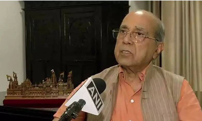 Senior man speaking into microphone with 'ANI' logo during interview.