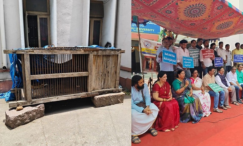 Protesters seated with placards opposing tribal art museum at a public event.