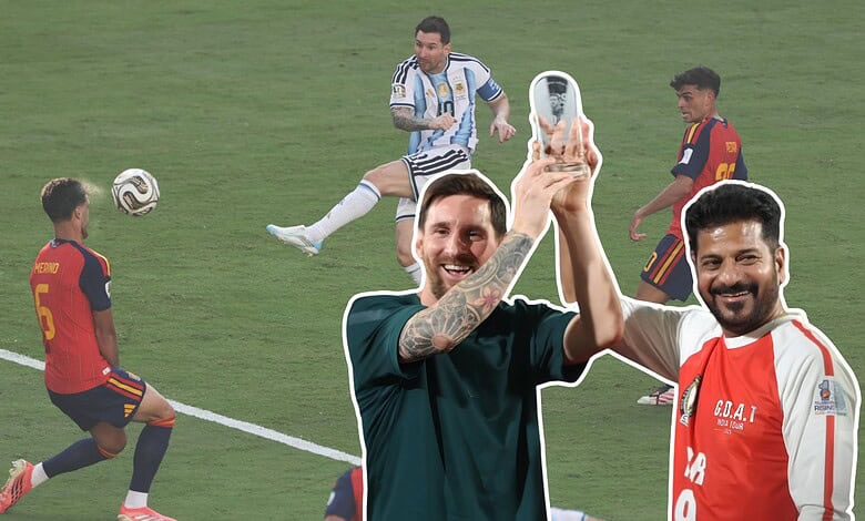 Football players celebrating on the field with a selfie during a match.