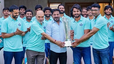 Revanth Reddy awards the TG20 winners during a sports event celebration.