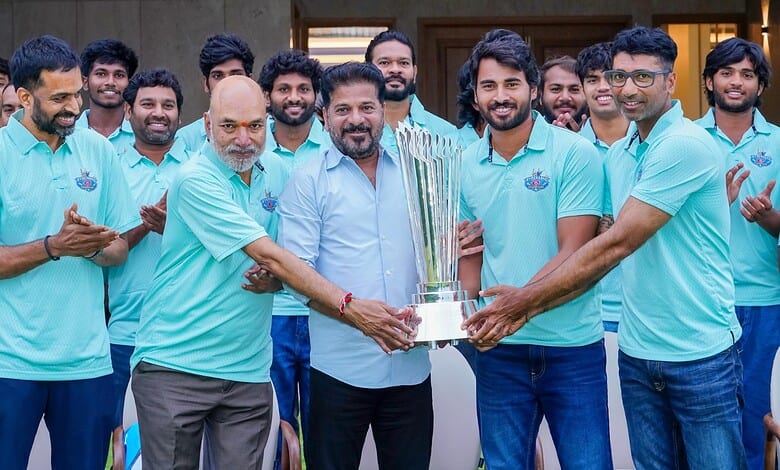 Revanth Reddy awards the TG20 winners during a sports event celebration.