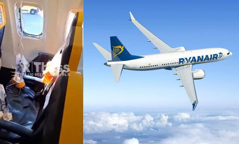Ryanair airplane flying high above clouds in clear blue sky.
