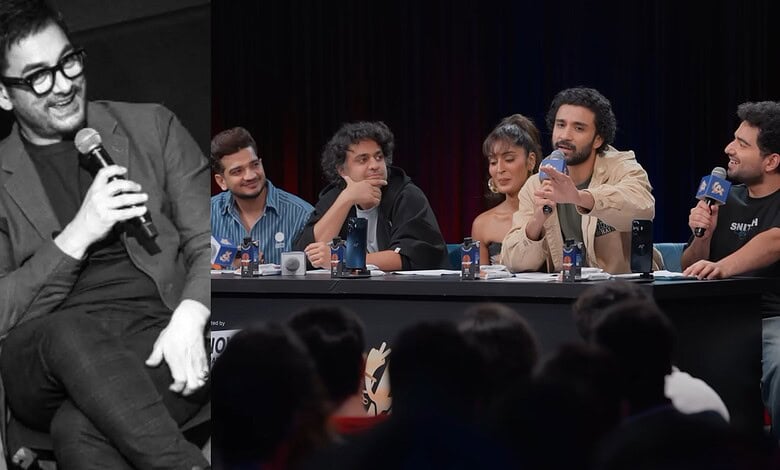Samay Raina and panel discuss on stage at a live event, audience in foreground.