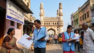 Election officials and voters engaging in voter roll revision near Charminar in Hyderabad.