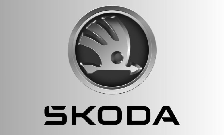 Skoda logo displayed prominently on a metallic surface, representing the automobile brand.