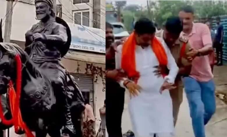 The image shows the police detaining Warangal BJP District President G Ravi Kumar when he tried to stop the police from removing Shivaji's statue from Bollikunta village on Friday, July 17, 2026.