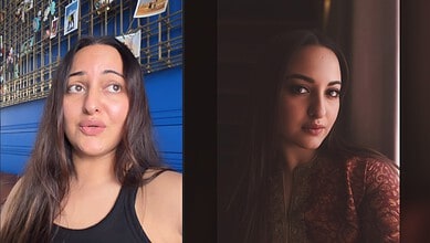 Sonakshi looking thoughtful with a blue background and photos on display behind her.