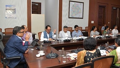 Officials and stakeholders discuss eco-tourism near tiger reserves in Telangana.