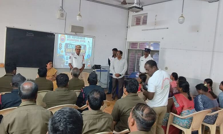 School bus staff attending traffic awareness training in Hyderabad classroom.