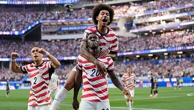 USA players celebrate victory over Bosnia- Herzegovina