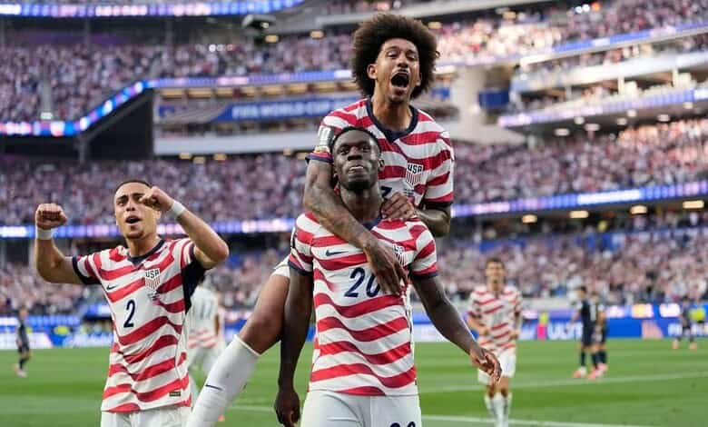 USA players celebrate victory over Bosnia- Herzegovina