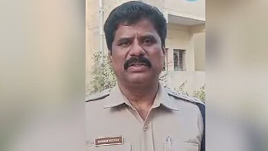 Hyderabad DSP's residence raid during DA case investigation, police officer in uniform.