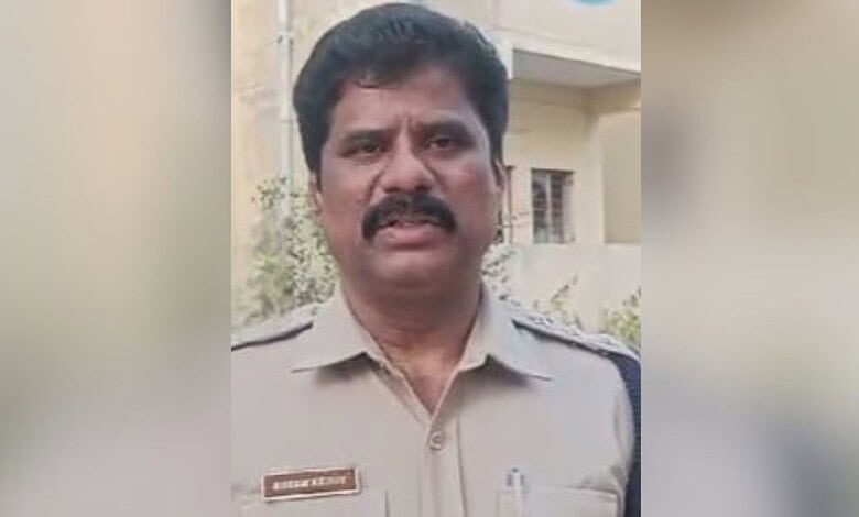 Hyderabad DSP's residence raid during DA case investigation, police officer in uniform.