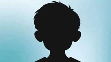 Silhouette of a missing student against a light blue background.