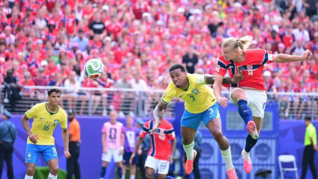Norwegian player Haaland scores a goal against Brazil in a World Cup match.