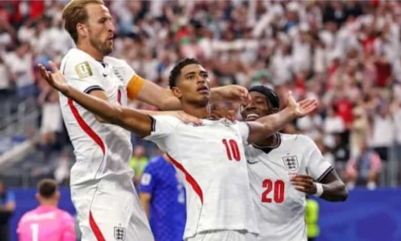 England players celebrating after scoring during the FIFA World Cup match against Mexico.