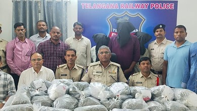 Telangana Railway Police display seized illegal items and apprehended suspects.