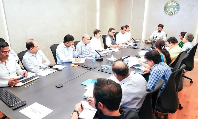 Panel discussion on digital governance with diverse professionals in a modern conference room.