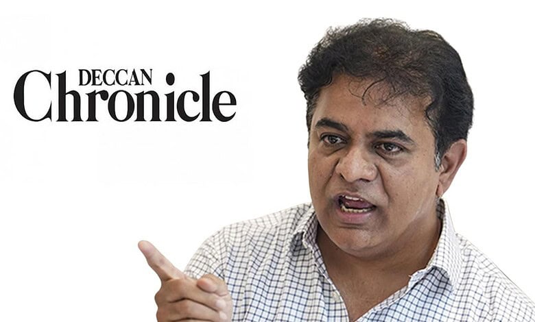 Indian man speaking passionately, pointing with his finger, in a professional setting.